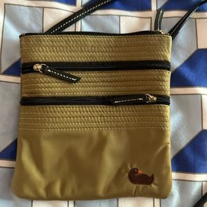 Dooney and Burke cross body purse. Excellent condition!